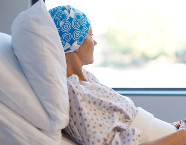 cancer patient looking out a window