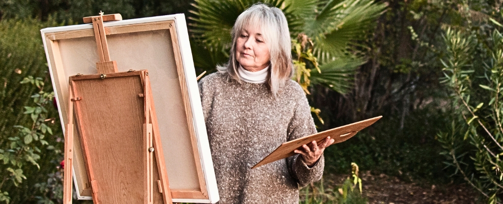 woman painting outside