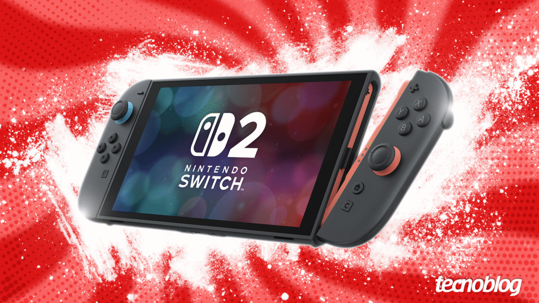 Console Nintendo Switch 2 inclinado à direita, com os controles destacados e tela ligada, sobre fundo colorido. O fundo é vermelho com efeitos de luz e respingos brancos. Logo do Tecnoblog no canto inferior direito.