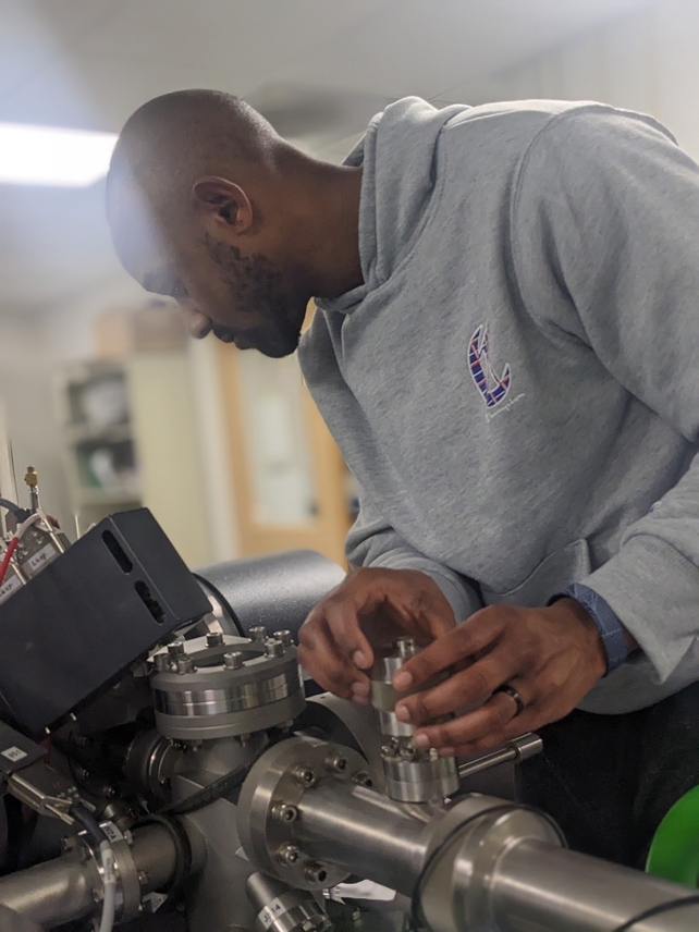 Scientist With Instrument