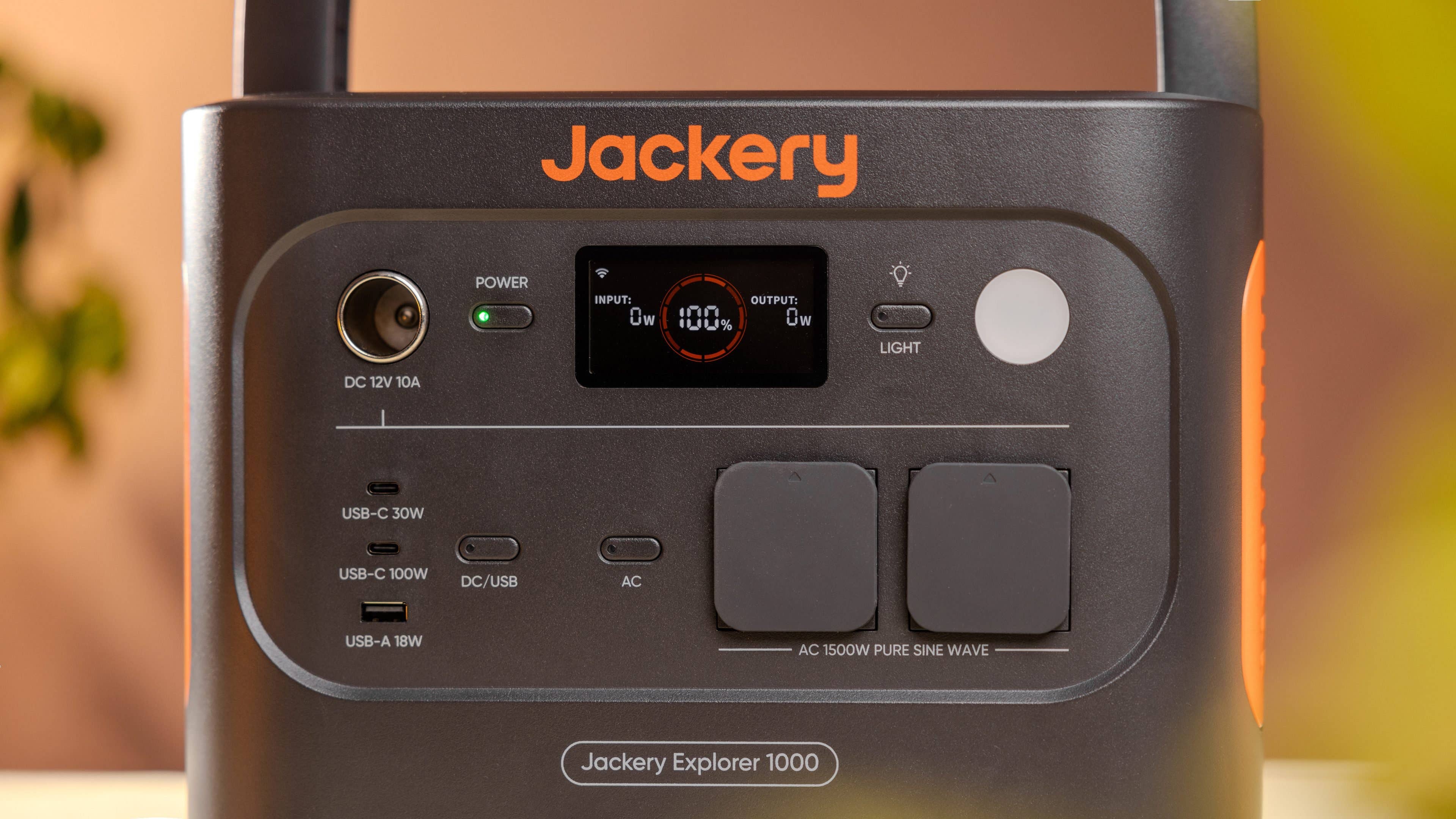 Jackery Explorer 1000 power station with various input/output ports and digital display.