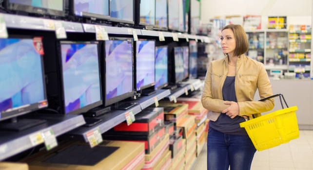 woman shopping for a tv