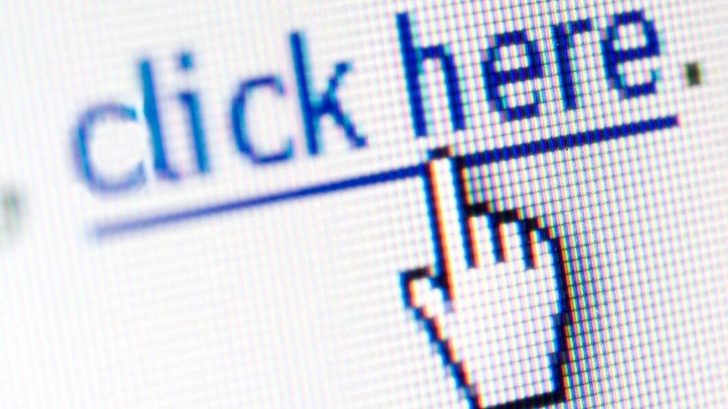 imagem de um link com a palavra "click here" e um ícone de seleção