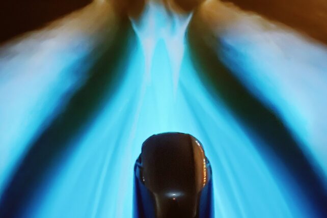 POV of a person kayaking in bioluminescence 