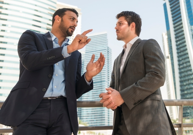 men in suits talking