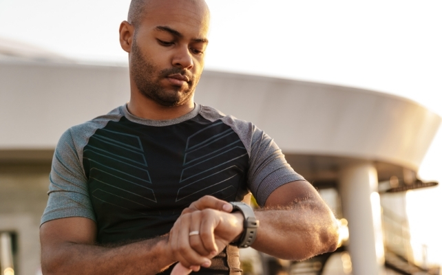 man looking at his watch