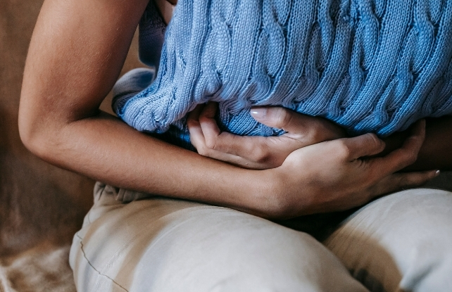 woman with stomach pain