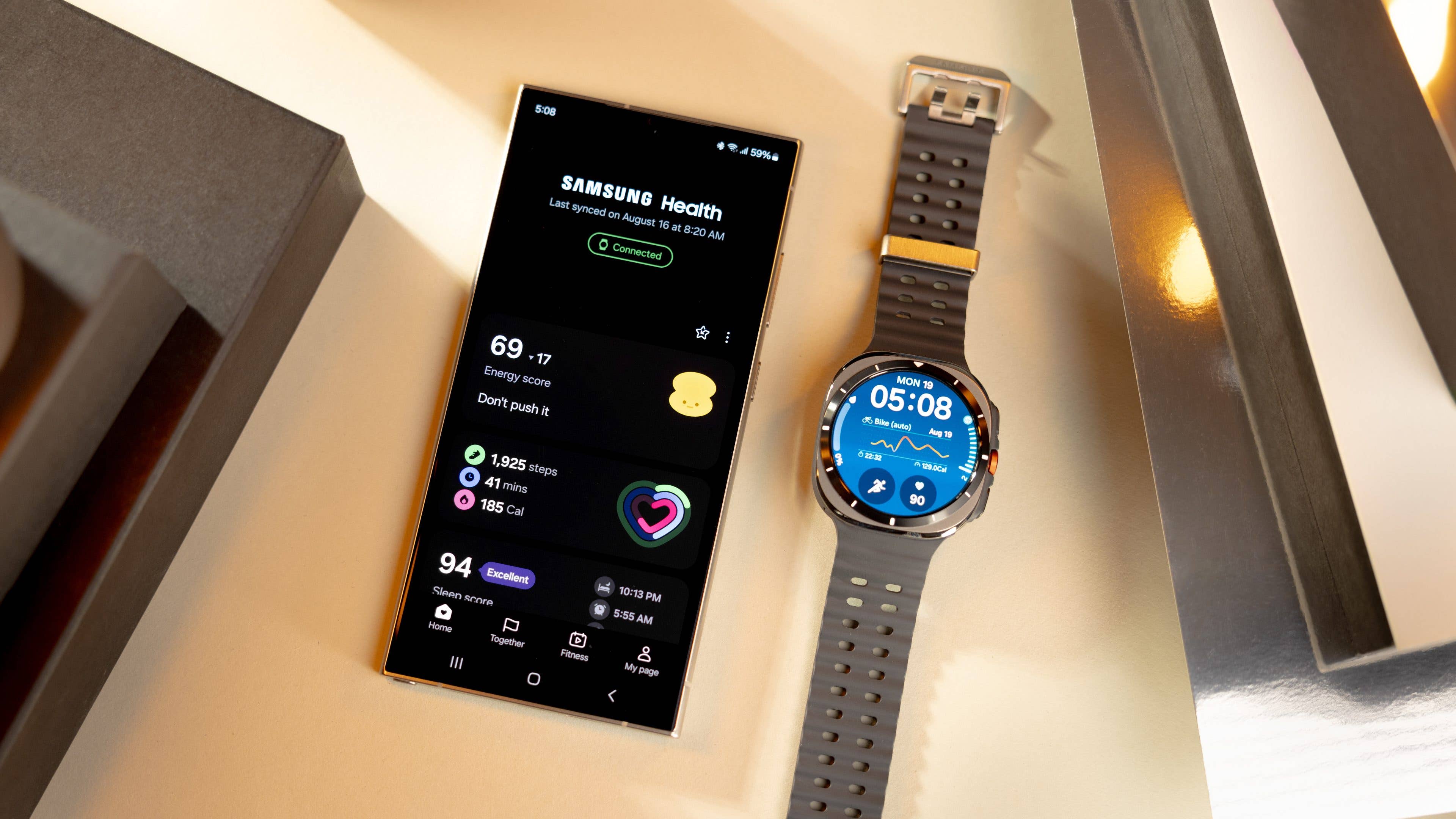 Samsung Galaxy Watch Ultra paired with the Galaxy smartphone.