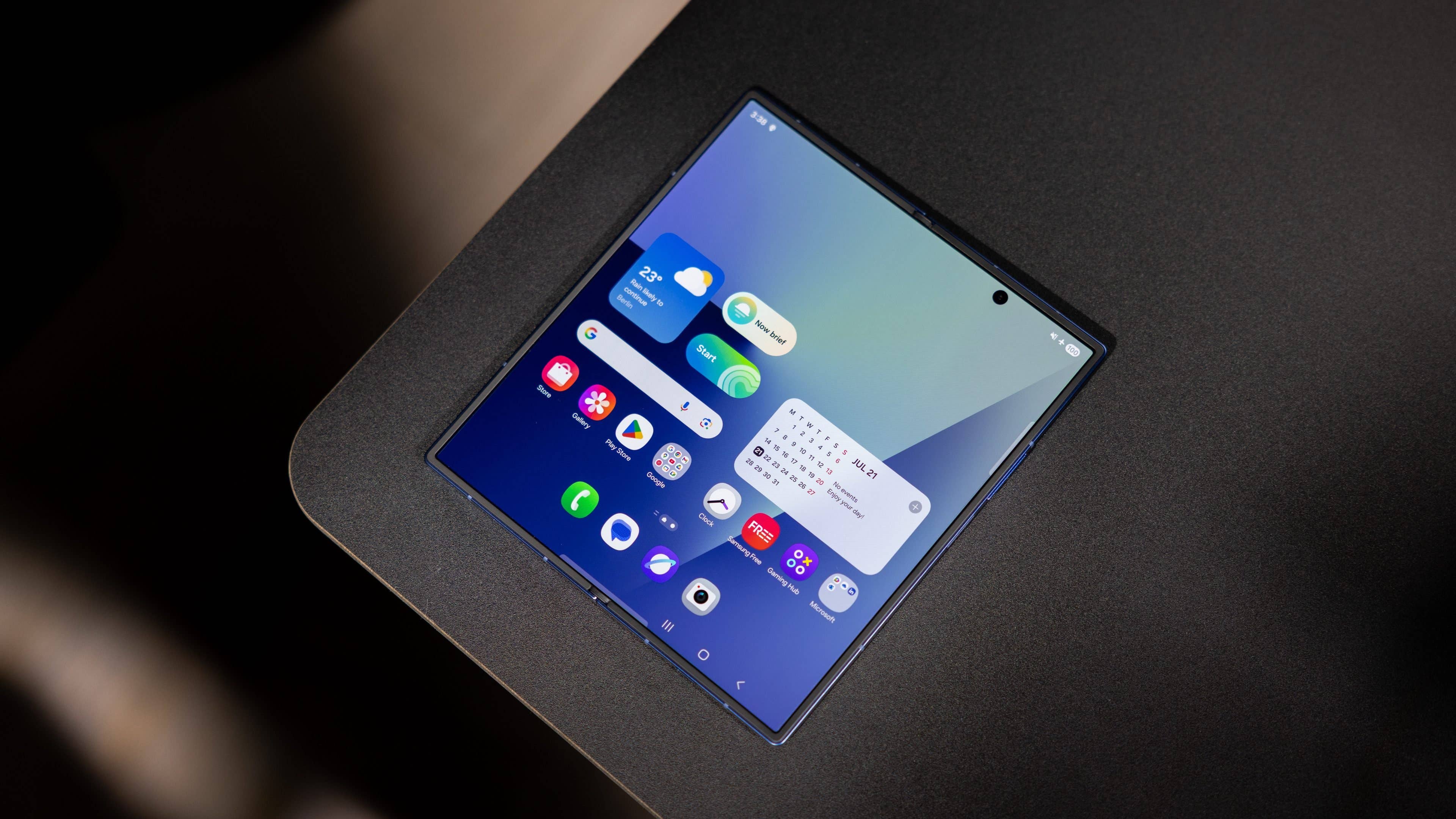 Samsung Galaxy Z Fold7 with a colorful app interface on a flat surface.