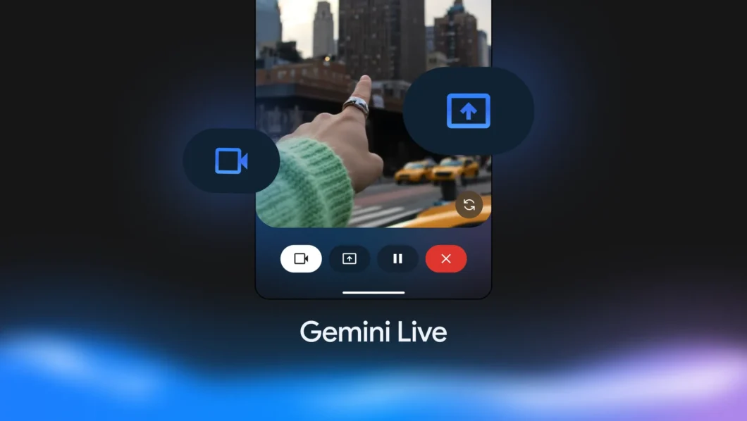 Tela de celular mostrando o recurso Gemini Live, um aplicativo de IA que permite transmitir vídeos ao vivo para a inteligência artificial analisar. A imagem mostra uma mão com suéter verde apontando para prédios e táxis amarelos em uma cidade. Na parte inferior há ícones para câmera, compartilhamento de tela, pausa e encerramento da transmissão, com fundo escuro e iluminação azul e roxa.