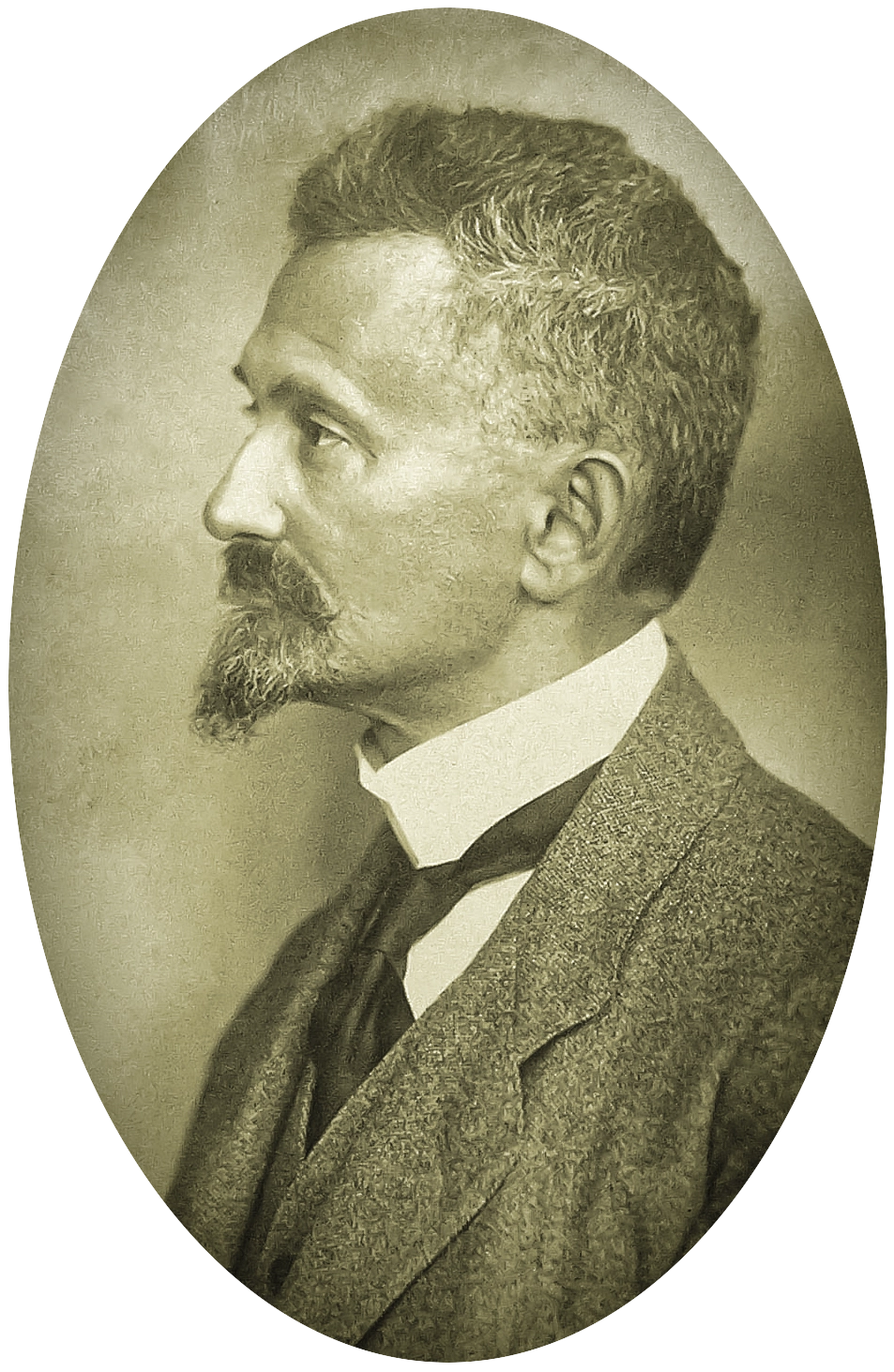 Bearded man in profile.