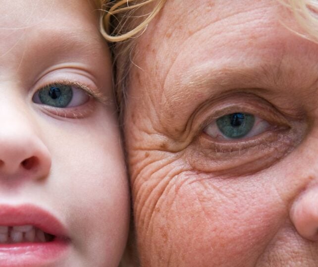 Close up of an old and a young face side by side