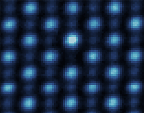 In a lattice of atoms, atoms light up individually 
