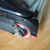 Dreame T16 Pro Heat mit Haaren in der Bürstenrolle